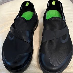 OOFOS men’s slippers.